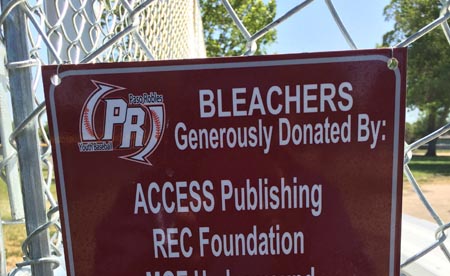 Access Publishing raises funds for new bleachers for youth baseball
